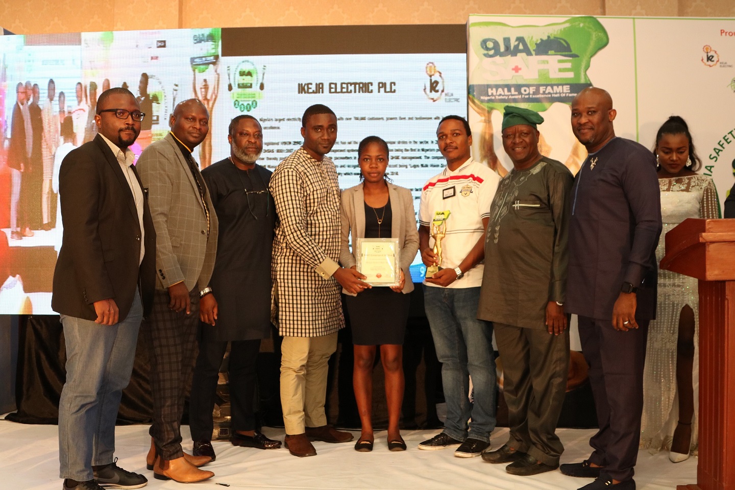 Third from left, Mr Steve Doriigi, Operation Manager, Ikeja City Mall and third from right, Hon. Kehinde Bamigbetan, Commissioner for Information and Strategy, Lagos State and Ikeja Electric Safety Officers displaying their awards during 2018 Nigeria Safety Award for Excellence (9jaSAFE Award) in Lagos-marketingspace.com.ng